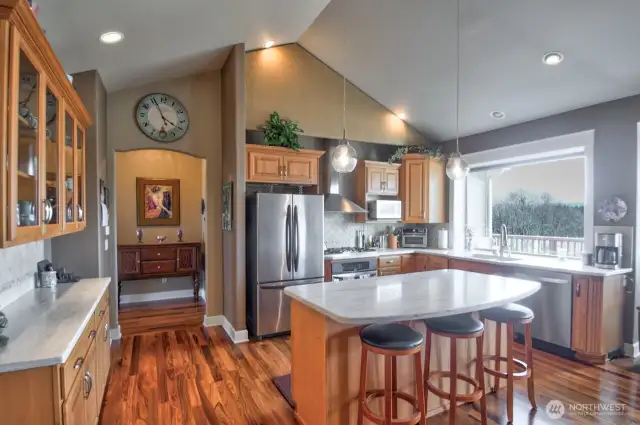 Spacious kitchen with Corian countertops, spectacular views, breakfast bar and loads of storage