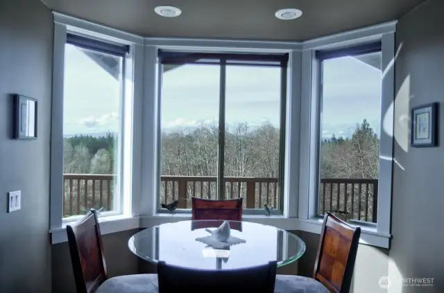 Breakfast nook just off the kitchen to dine and enjoy the views outside
