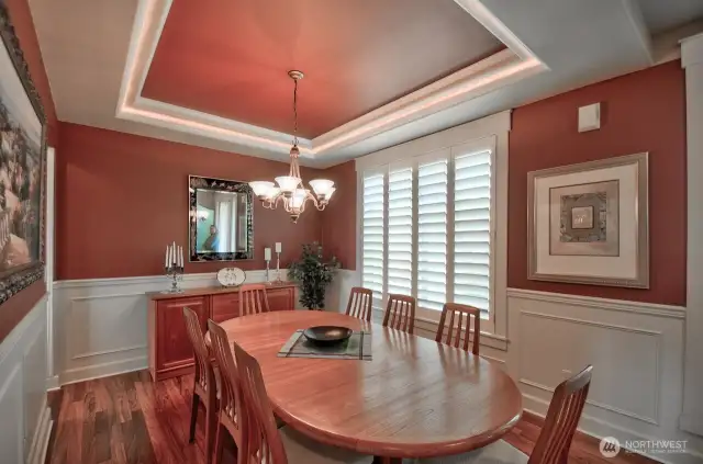 Just to the right inside the entry is a formal dining area with butlers pantry