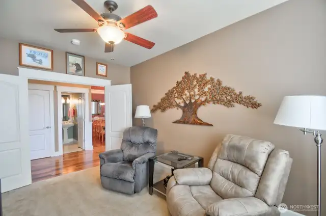 Next room on the left is the office/den with french doors