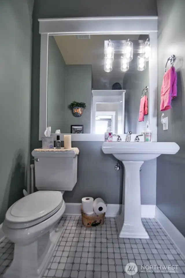 Half bath just across the hall from the office/den