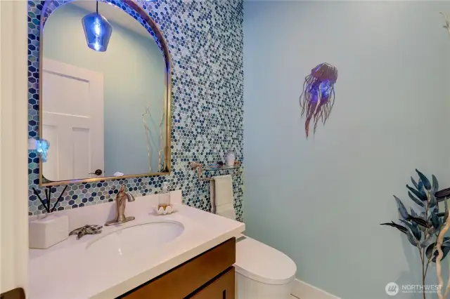 Upgraded powder room with designer touches.