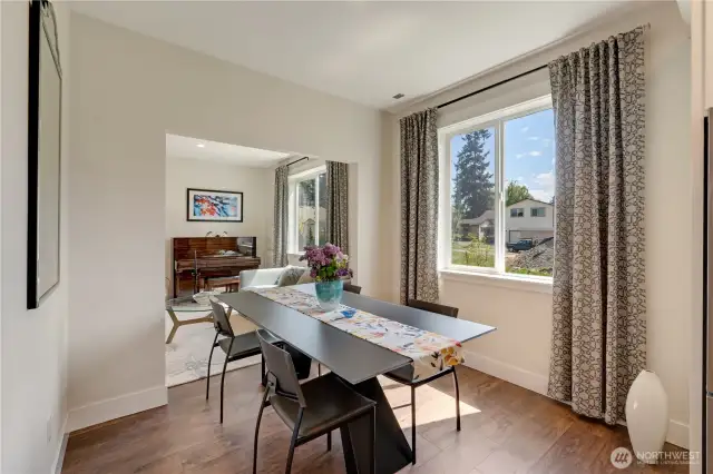 Dining area overlooking the beautiful multi-coloured side garden.