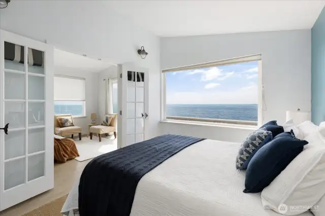 Relax and take in your never ending water views from your primary bedroom, opens out to the family room.