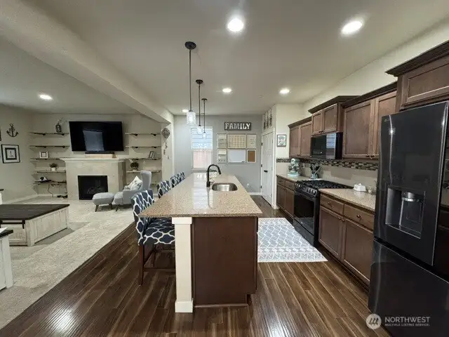Another view of kitchen/living area