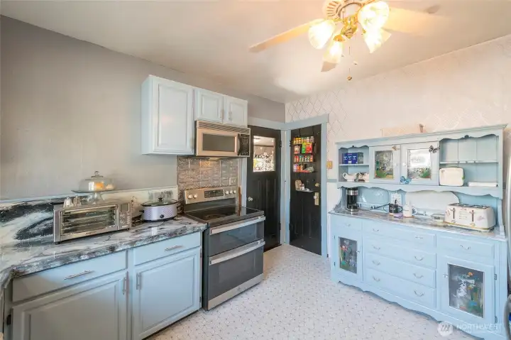 Additional cabinet storage and counter space.