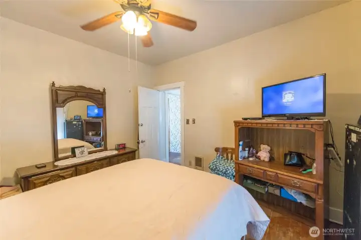 Generous bedroom with plenty of space for furniture and décor.