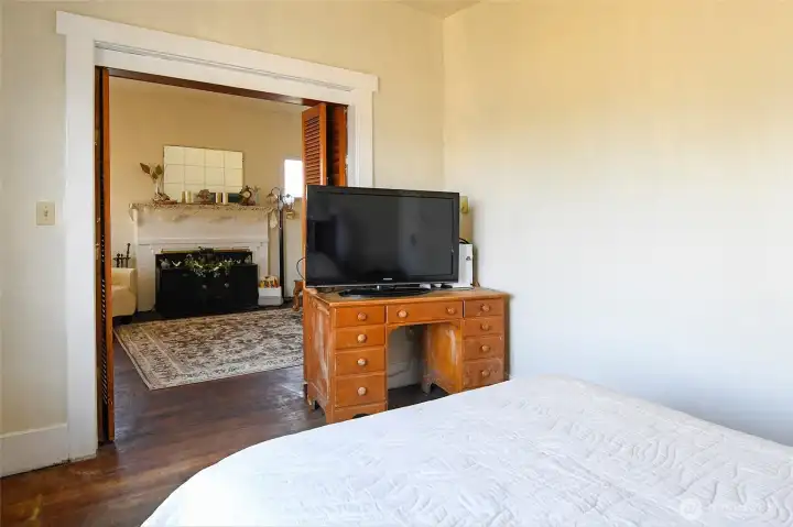 Additional bedroom connects seamlessly to the main living space, while still offering privacy and flexibility.