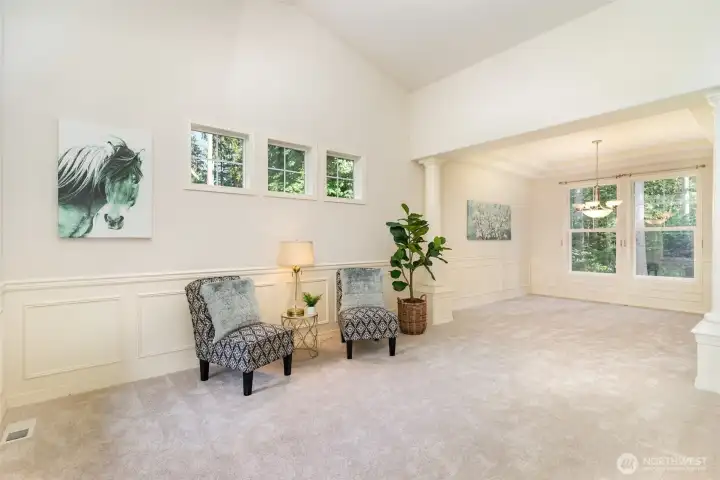 Bright, open concept living & dining rooms.