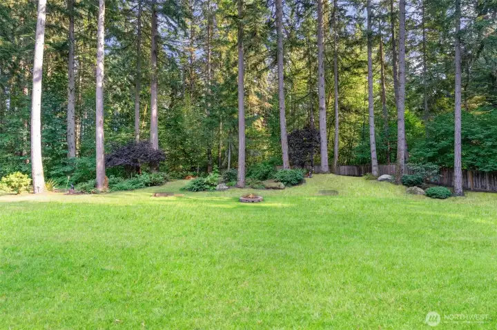 Plenty of space for all the lawn sports featuring a fully-fenced yard & Greenbelt privacy!