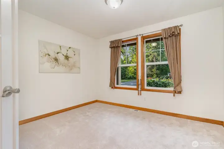 Main floor office features French doors.