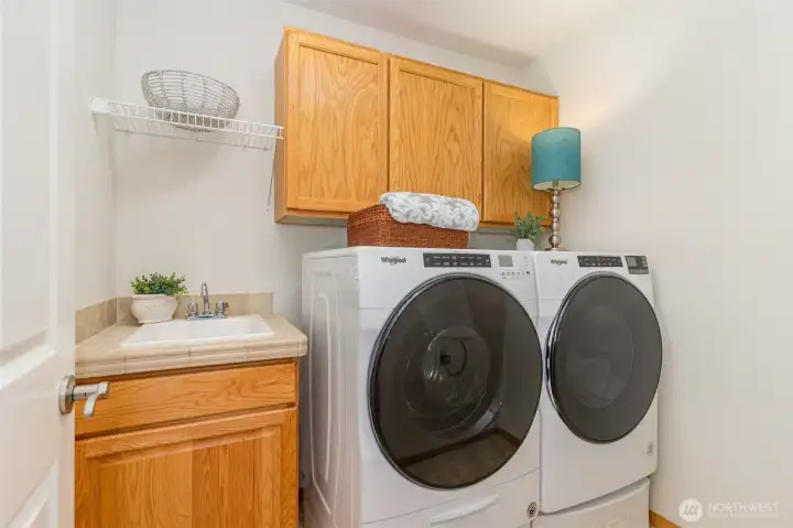 Upstairs laundry room is conveniently located near the bedrooms.