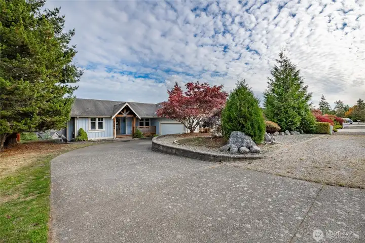 Privately tucked away from the road with ample parking