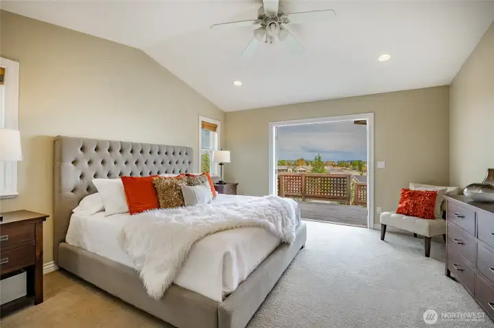 Primary with french doors leading to the deck