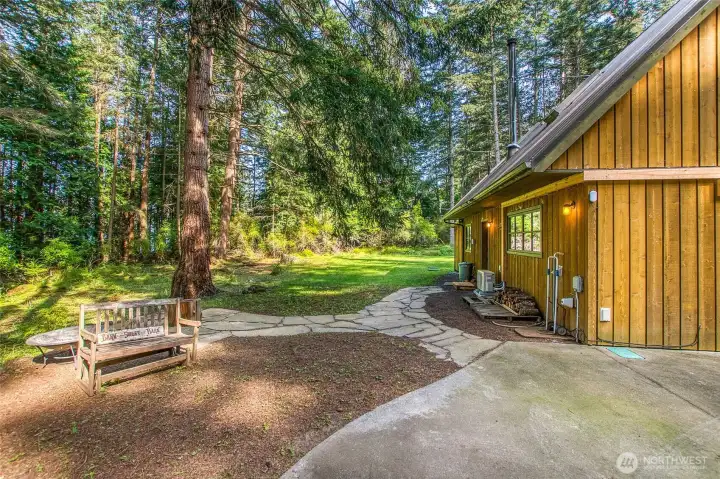 Patio nestled in the quiet woods.
