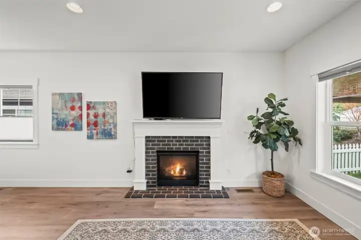 Brick surround propane fireplace brings warmth and ambiance