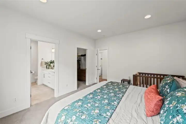 Your primary on the main level features a roomy walk-in closet and 5-piece bath en suite.