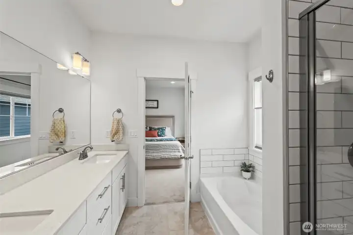 Warm and welcoming bath with elevated, easy-care surfaces