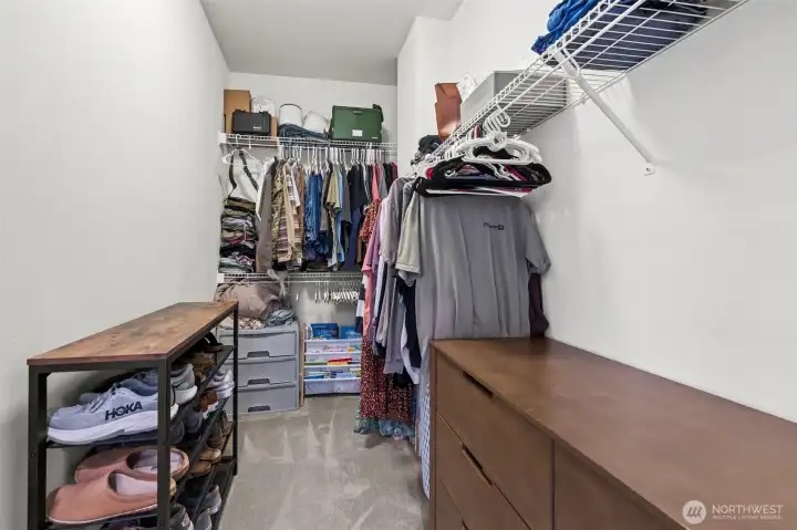 Primary closet has so much storage space