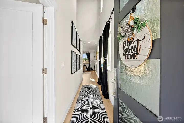 Welcome your guests at the 9' entry door into this two story entry and light filled home.