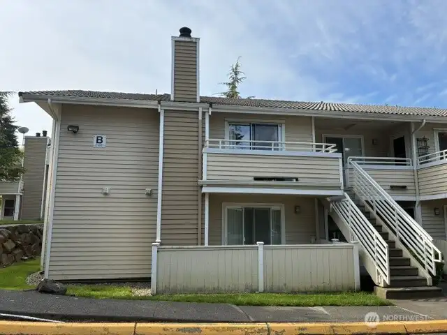 Ground floor corner unit with no steps and has fenced patio with storage.