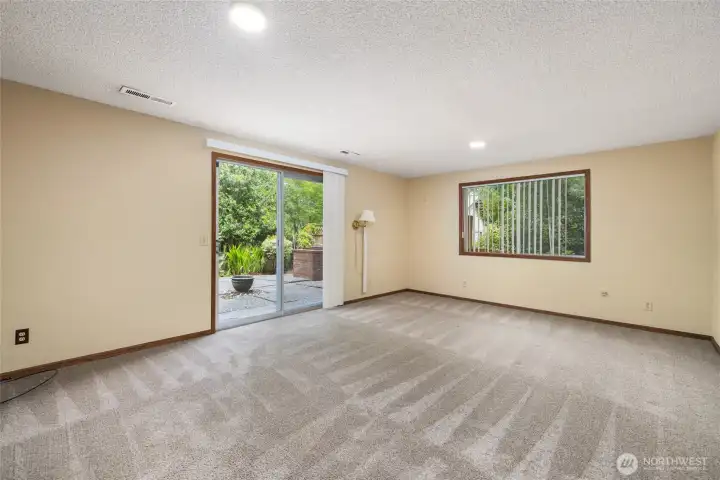 Living room behind garage