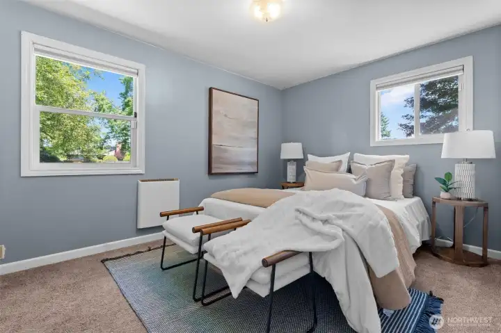 Endless possibilities! This bright and comfortable spare bedroom is ready to become a home office, a cozy den, or a welcoming room for visitors.