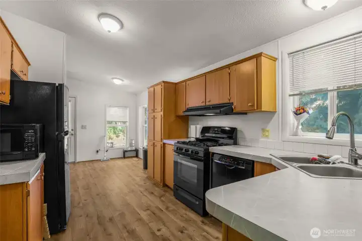 Kitchen connects to pantry and laundry room.