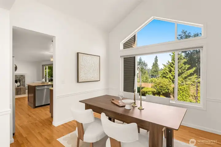Formal dining room with backyard views