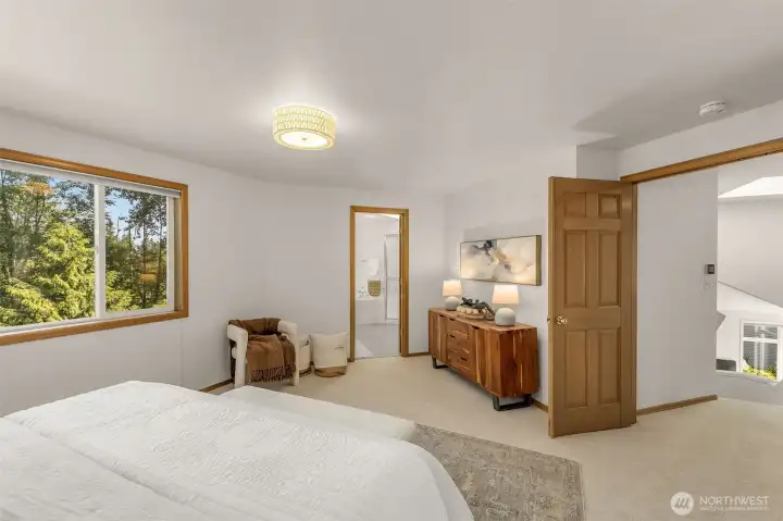 French doors to primary with private spa bath