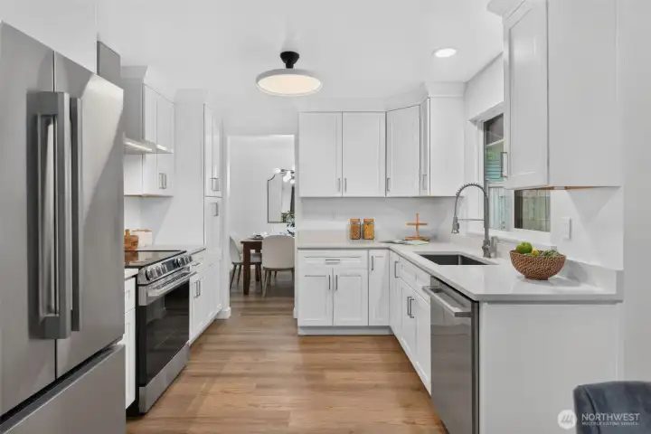 Open it up and check out the beautiful blue interior of this brand-new LG oven—just one of the fun details in this fully renovated kitchen.