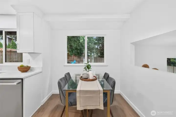 A sunny eat-in nook just off the kitchen—perfect for morning coffee, casual meals, homework, or lingering over one more cup.