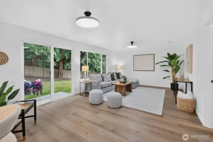 A spacious bonus room with direct backyard access and room to flex—movie nights, playroom, home gym, office, game room…or a little bit of everything!