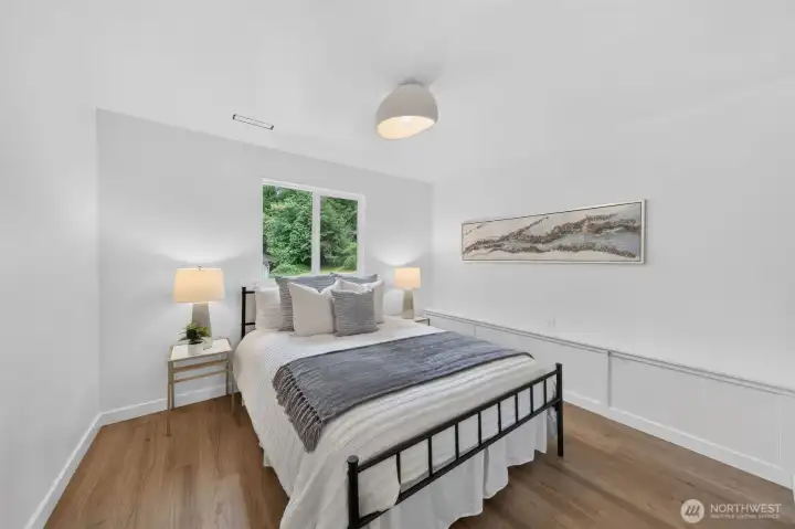 This third bedroom offers wonderful flexibility—perfect as a guest room, home office, workout space, or a quiet spot to simply make your own.