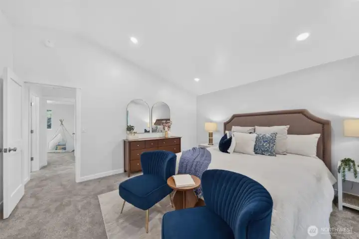 Spacious, serene, and connected to the rest of the upper level—this primary suite feels private without feeling tucked away.
