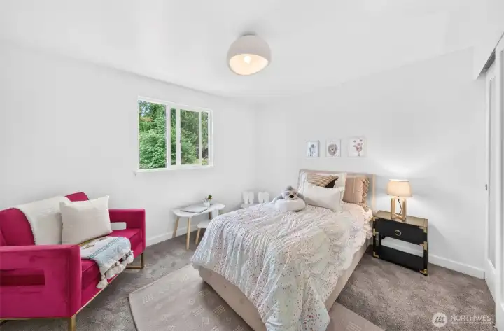 Bedroom two feels bright, playful, and full of possibility—with room to sleep, read, create, and let a little personality shine.