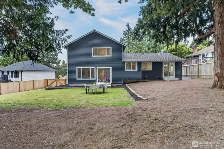 Here’s the full picture—an expansive, fully fenced backyard framed by mature trees and ready for your next chapter. Garden parties, backyard games, quiet mornings, lively evenings…this is where everyday life gets a little more memorable.