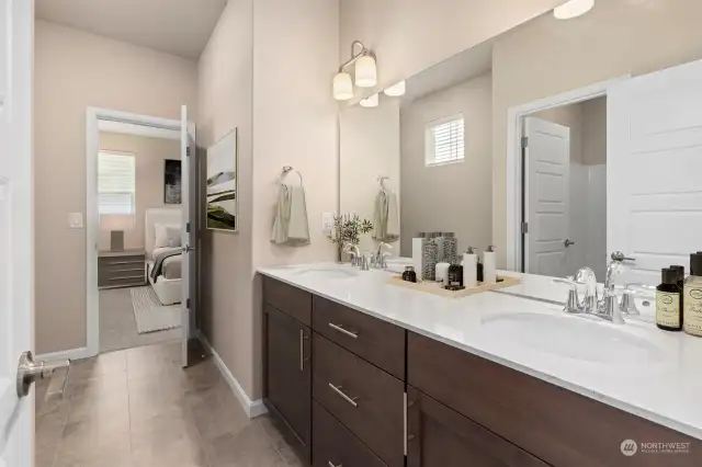 Common bathroom on upper level (virtually staged)