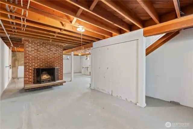 2nd wood fireplace on lower level could be the warm backdrop to your creative dreams.
