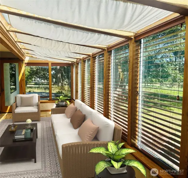 This photo is virtually staged to show you what this lovely sunroom can look like when furnished.