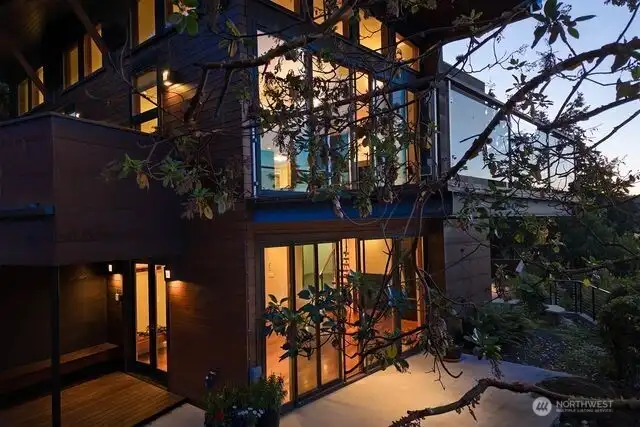 A soft mixture of walls of glass to enjoy the spectacular views. Cor-ten and cedar siding blend into nature. Several decks, upper and lower, that grace the landscape.