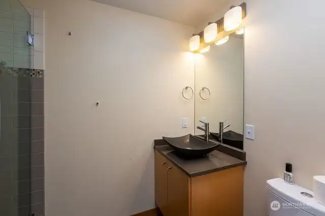 Guest apartment bath with shower.