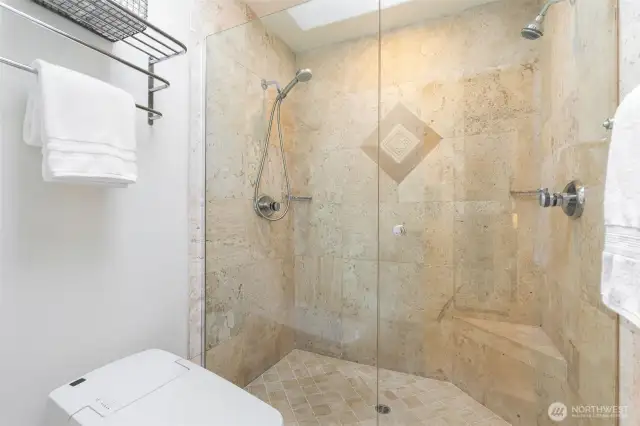 Spa Shower w/ Tiled Travertine, Frameless Glass, & Bidet