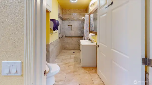 Main floor bathroom with roll-in shower.