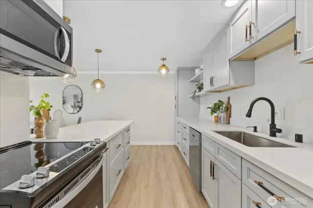 The cabinetry was extended to span the entire back wall of the unit!