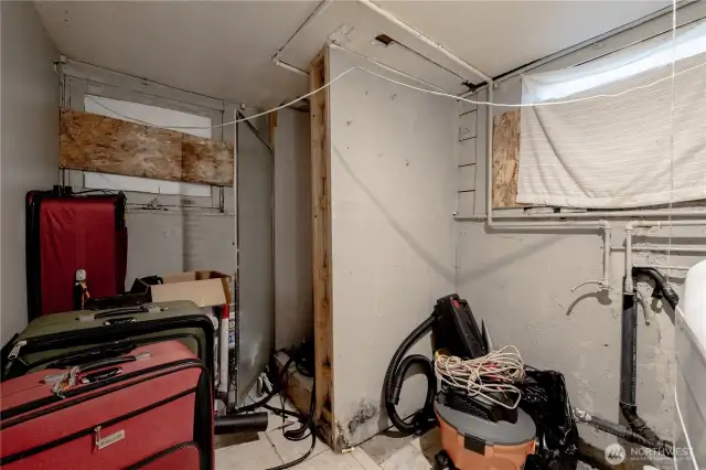 old shower in back, could  add toilet plumed