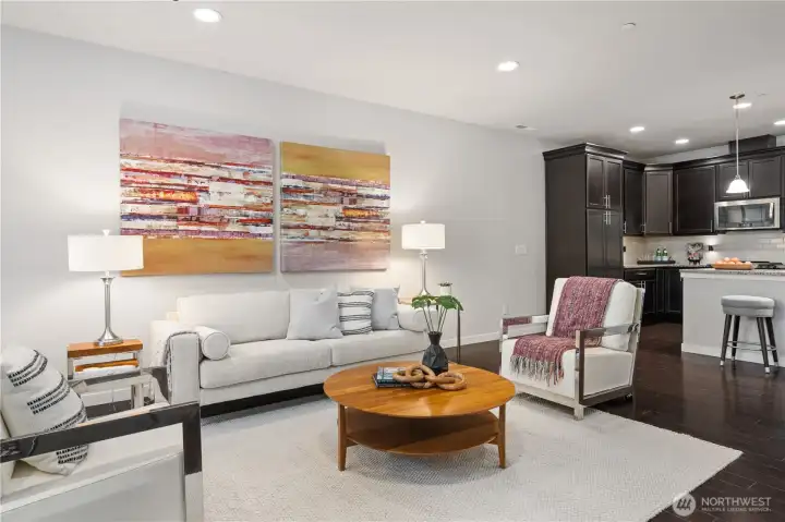 The great room is a perfect entertaining space with living, kitchen and dining rooms all flowing together