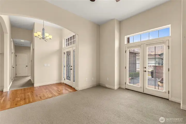 From study see pretty bright doors to western patios.