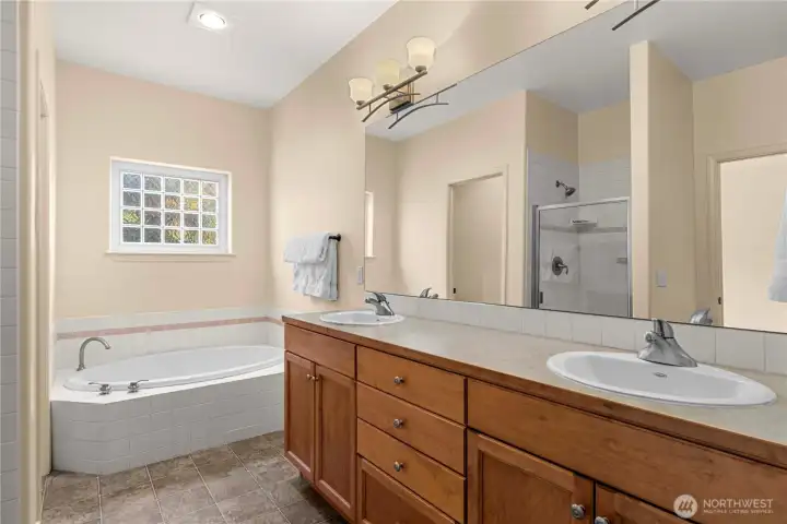 Double sinks and soaking tub.