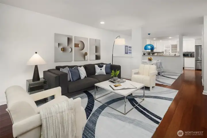 Contemporary Great Room with gorgeous cherry hardwood floor, Dining Room, Powder Bathroom and open Kitchen.